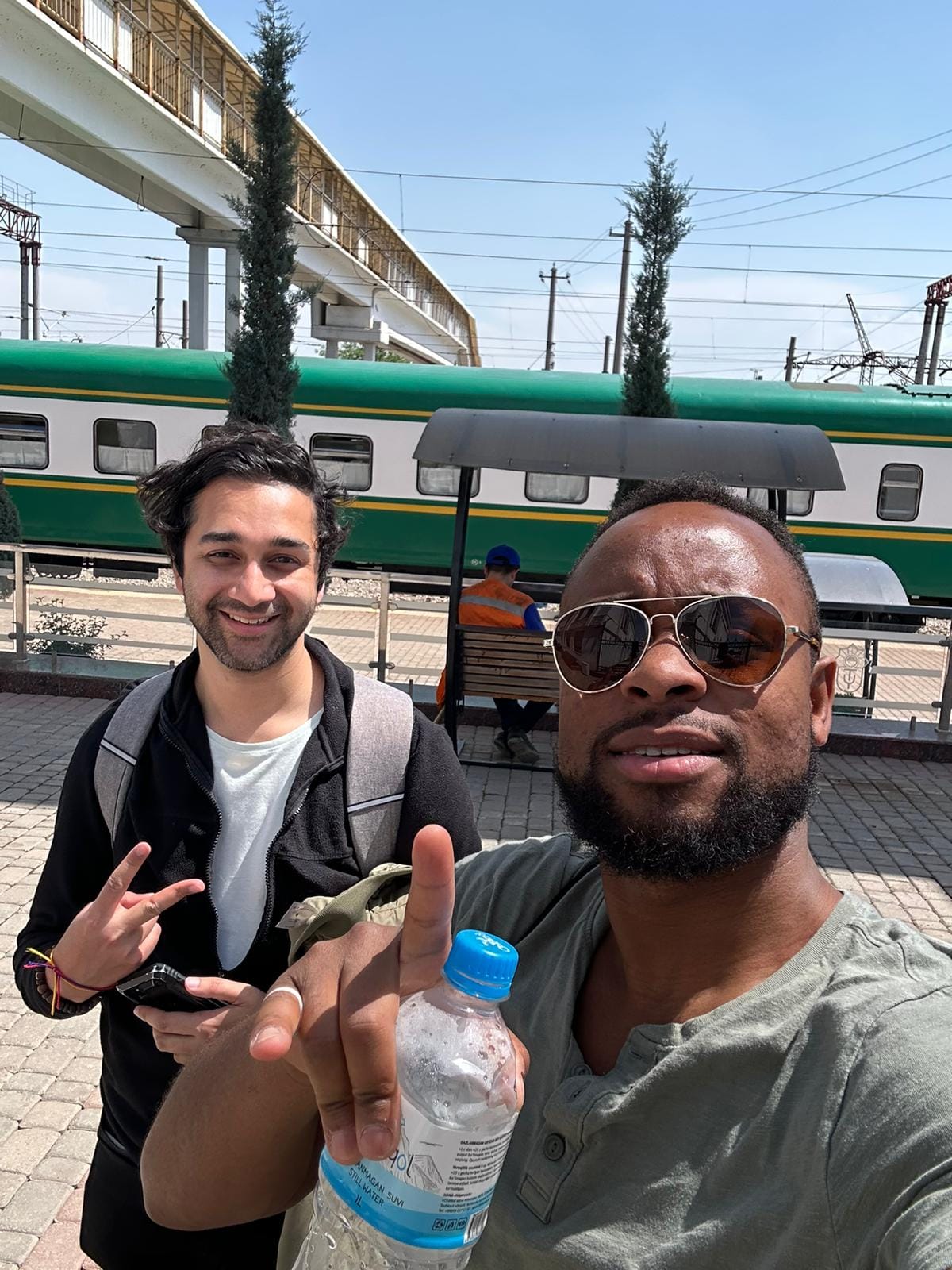 Deep Biswas with his friend Bode at a railway station while backpacking in Uzbekistan.